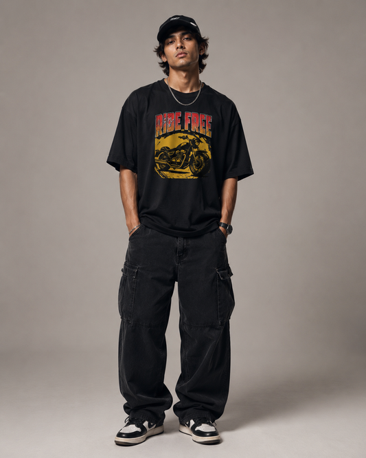 man posing to show how to style the oversized tshirt