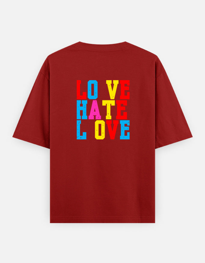 Red oversized unisex t shirt featuring a back print with stacked LOVE HATE LOVE typography in bold red, blue, yellow, and pink block lettering. Made from premium 240 GSM 100% cotton with a relaxed oversized fit. Available in Black and Cream by Shisha.