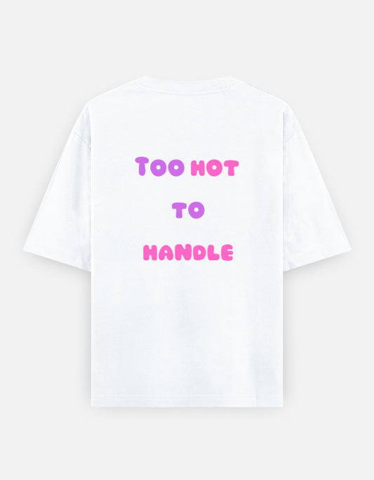 White oversized unisex t shirt featuring a back print with the phrase TOO HOT TO HANDLE in bold retro bubble typography with a pink and purple gradient. Made from premium 240 GSM 100% cotton with a relaxed oversized fit. Available in Black and Cream by Shisha.