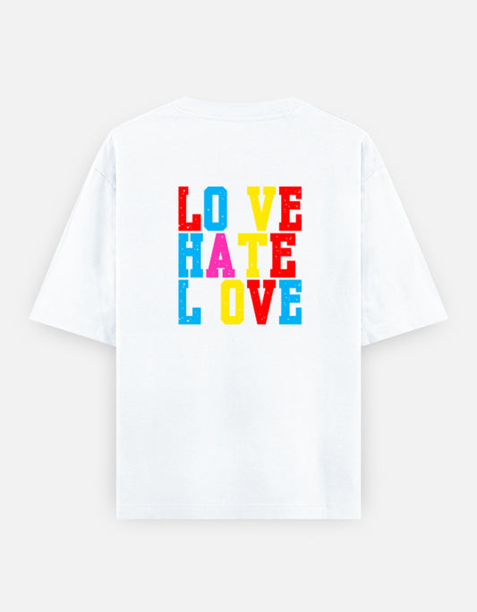 White oversized unisex t shirt featuring a back print with stacked LOVE HATE LOVE typography in bold red, blue, yellow, and pink block lettering. Made from premium 240 GSM 100% cotton with a relaxed oversized fit. Available in Black and Cream by Shisha.