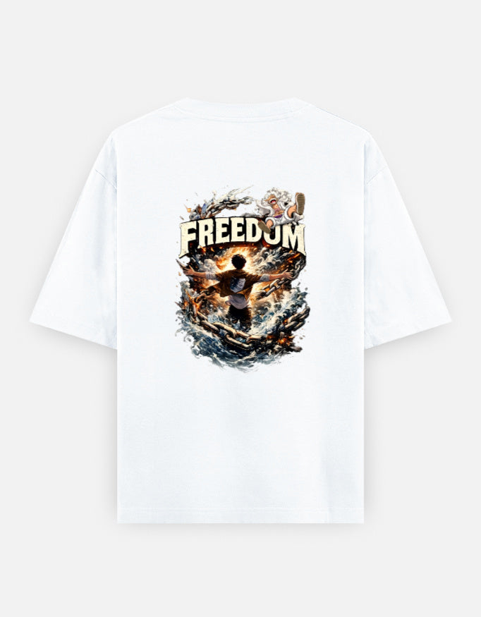 A white short-sleeve t-shirt shown from the back, featuring a large graphic print which have luffy and eren from anime one pieace and attack on titan with the word 'FREEDOM' and a dramatic fiery illustration.