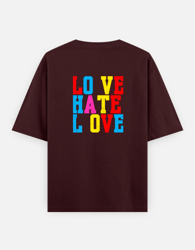Maroon oversized unisex t shirt featuring a back print with stacked LOVE HATE LOVE typography in bold red, blue, yellow, and pink block lettering. Made from premium 240 GSM 100% cotton with a relaxed oversized fit. Available in Black and Cream by Shisha.