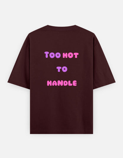 Maroon oversized unisex t shirt featuring a back print with the phrase TOO HOT TO HANDLE in bold retro bubble typography with a pink and purple gradient. Made from premium 240 GSM 100% cotton with a relaxed oversized fit. Available in Black and Cream by Shisha.