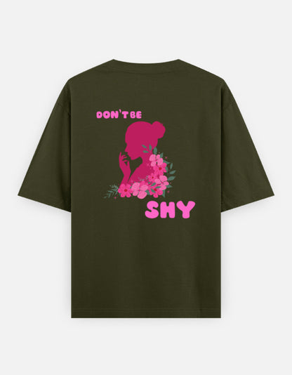 oversized unisex t shirt featuring a back print of a pink floral silhouette of a woman surrounded by blooming flowers with the words DON'T BE SHY.