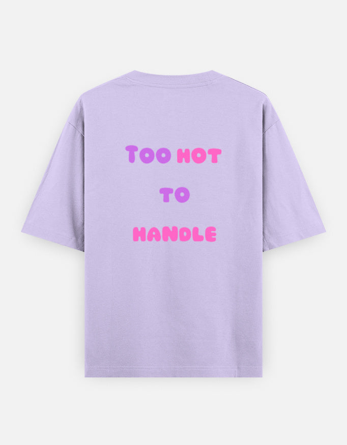 Lavender oversized unisex t shirt featuring a back print with the phrase TOO HOT TO HANDLE in bold retro bubble typography with a pink and purple gradient. Made from premium 240 GSM 100% cotton with a relaxed oversized fit. Available in Black and Cream by Shisha.