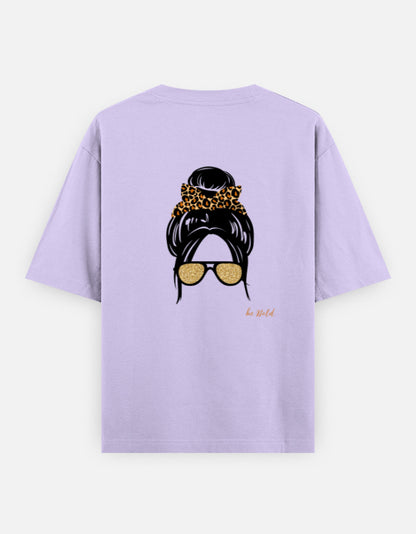 Lavender oversized unisex t shirt featuring a back print of a minimalist fashion illustration with a high messy bun tied with a leopard print scrunchie and oversized gold sunglasses. Made from premium 240 GSM cotton with a relaxed streetwear fit. Available in Black and Cream by Shisha.