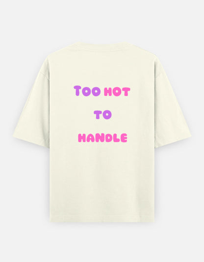 Off-White oversized unisex t shirt featuring a back print with the phrase TOO HOT TO HANDLE in bold retro bubble typography with a pink and purple gradient. Made from premium 240 GSM 100% cotton with a relaxed oversized fit. Available in Black and Cream by Shisha.