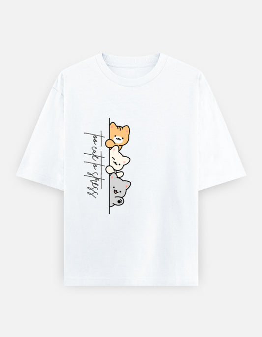 White oversized unisex t shirt featuring a cute front print of three cartoon cats peeking from behind a vertical line with the text "perfect stress." Made from premium 240 GSM cotton with a relaxed oversized streetwear fit. Available in Black and Cream by Shisha.