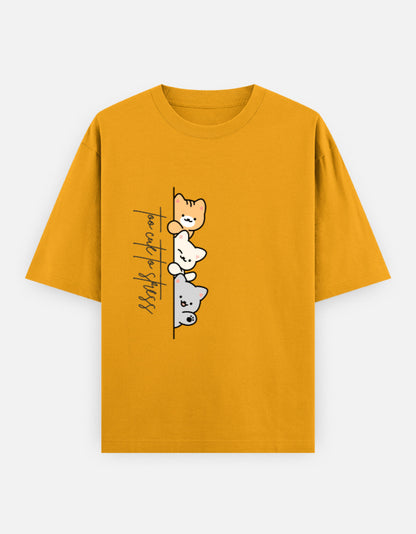 Yellow oversized unisex t shirt featuring a cute front print of three cartoon cats peeking from behind a vertical line with the text "perfect stress." Made from premium 240 GSM cotton with a relaxed oversized streetwear fit. Available in Black and Cream by Shisha.