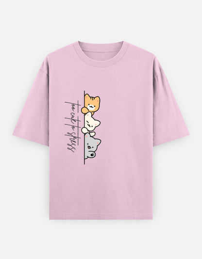Pink oversized unisex t shirt featuring a cute front print of three cartoon cats peeking from behind a vertical line with the text "perfect stress." Made from premium 240 GSM cotton with a relaxed oversized streetwear fit. Available in Black and Cream by Shisha.