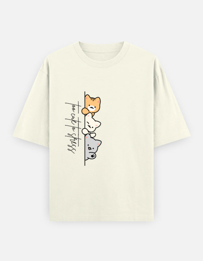 Off-White oversized unisex t shirt featuring a cute front print of three cartoon cats peeking from behind a vertical line with the text "perfect stress." Made from premium 240 GSM cotton with a relaxed oversized streetwear fit. Available in Black and Cream by Shisha.